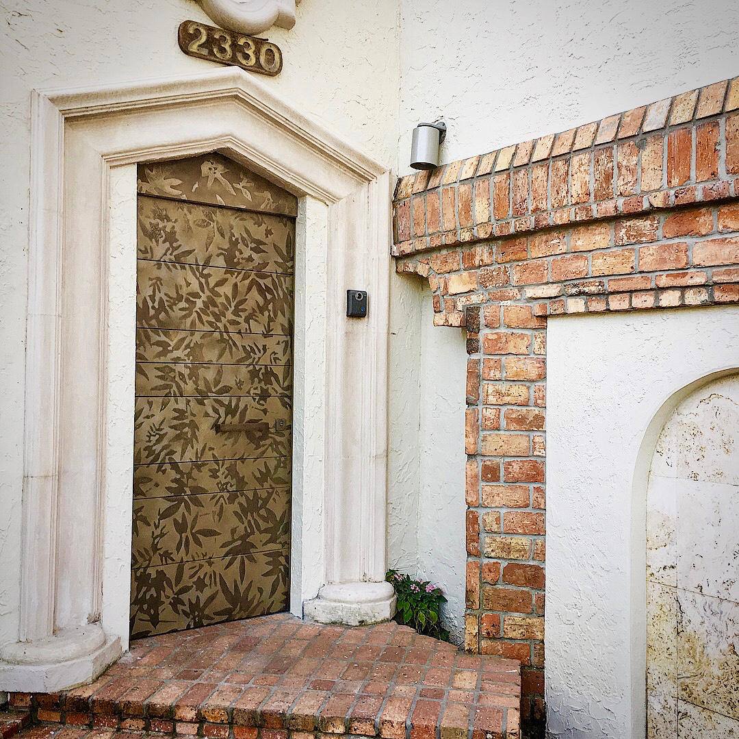Custom Liquid Metal Estate Door